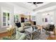 Bright living room boasts hardwood floors, an open floorplan, and tons of natural light at 3513 Forest Oaks Dr, Chapel Hill, NC 27514