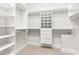 Spacious walk-in closet with shelving and drawers at 3513 Forest Oaks Dr, Chapel Hill, NC 27514