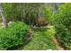 Picture of a meticulously maintained yard with mature trees at 3826 Regent Rd, Durham, NC 27707