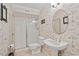 Paris themed bathroom with stand alone sink and a glass enclosed shower at 3826 Regent Rd, Durham, NC 27707