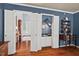 View of a butler's pantry with wet bar and white cabinetry at 3826 Regent Rd, Durham, NC 27707