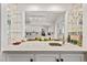 Kitchen pass through with cabinetry and quartz countertops at 3826 Regent Rd, Durham, NC 27707