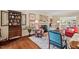 Bright and airy living room with hardwood floors, fireplace, and stylish furnishings at 3826 Regent Rd, Durham, NC 27707