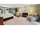 Spacious main bedroom features a fireplace, sitting area, and large windows at 3826 Regent Rd, Durham, NC 27707