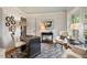 Stylish office with a large window, desk, comfortable seating, and unique decor at 3826 Regent Rd, Durham, NC 27707