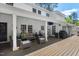 Inviting covered deck featuring comfortable seating and outdoor entertaining space at 3826 Regent Rd, Durham, NC 27707