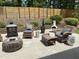 Relaxing backyard patio with cozy seating and fireplace, perfect for outdoor entertainment at 406 Sapphire Dr, Durham, NC 27703