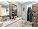 Modern bathroom with double vanity, granite countertops, and decorative accents at 406 Sapphire Dr, Durham, NC 27703