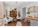 Comfortable living room with hardwood floors, bookshelves, and stylish decor at 406 Sapphire Dr, Durham, NC 27703