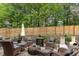 Inviting patio area with a charming fire pit and comfortable seating for outdoor relaxation and entertainment at 406 Sapphire Dr, Durham, NC 27703