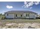 Backyard featuring back porch area and landscaping at 42 Voyage Cir, Smithfield, NC 27577