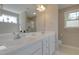 Bathroom featuring double sinks, white cabinets, and ample counter space at 42 Voyage Cir, Smithfield, NC 27577