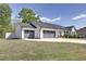 Lovely house shows three-car garage and well-maintained lawn at 42 Voyage Cir, Smithfield, NC 27577