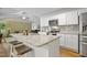 Well-appointed kitchen with granite island and seating area at 42 Voyage Cir, Smithfield, NC 27577