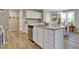 Modern kitchen with granite countertops and stainless steel appliances at 42 Voyage Cir, Smithfield, NC 27577
