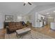 Bright living room shows couch, cabinets and kitchen area at 42 Voyage Cir, Smithfield, NC 27577