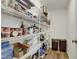 Walk-in pantry featuring wire shelving for ample storage of food and household items at 42 Voyage Cir, Smithfield, NC 27577