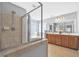 Elegant bathroom featuring tile shower, corner tub, and double vanity at 421 Gooseberry Dr, Holly Springs, NC 27540