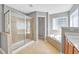 Bathroom featuring a glass shower, soaking tub, and double sink at 421 Gooseberry Dr, Holly Springs, NC 27540
