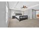 Spacious bedroom with tray ceiling and traditional furnishings at 421 Gooseberry Dr, Holly Springs, NC 27540