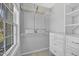 Organized closet with wire shelving, baskets, and a built-in white dresser at 421 Gooseberry Dr, Holly Springs, NC 27540