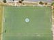 Full aerial view of a large soccer field with the town's logo in the center, excellent for community sports at 421 Gooseberry Dr, Holly Springs, NC 27540