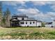 Two-story home boasts a covered back porch and a spacious yard at 45 Hamilton Way, Youngsville, NC 27596