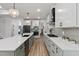 Modern kitchen with a large island, light countertops, stainless steel appliances, and stylish design at 45 Hamilton Way, Youngsville, NC 27596