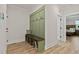 Mudroom with built in storage and bench at 45 Hamilton Way, Youngsville, NC 27596