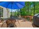 Outdoor deck features a dining area and lounge seating, ideal for entertaining guests or relaxing at 4513 Touchstone Forest Rd, Raleigh, NC 27612