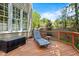 Wood deck with chaise lounge at 4513 Touchstone Forest Rd, Raleigh, NC 27612