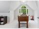 Game room with Foosball table and large window at 4513 Touchstone Forest Rd, Raleigh, NC 27612