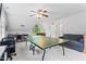 Upstairs game room with ping pong table, sofa, and a large window at 4513 Touchstone Forest Rd, Raleigh, NC 27612
