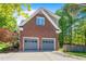 Detached two-car garage with a basketball hoop, offering ample parking and recreational space at 4513 Touchstone Forest Rd, Raleigh, NC 27612