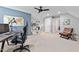 Bright home office leading to hallway with a world map and built in bookshelf at 4513 Touchstone Forest Rd, Raleigh, NC 27612