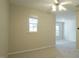 Open bedroom with lots of natural light and a ceiling fan, providing a comfortable atmosphere at 4517 Pale Moss Dr, Raleigh, NC 27606