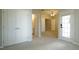 Spacious neutral bedroom with closet, bathroom and balcony access at 4517 Pale Moss Dr, Raleigh, NC 27606