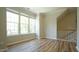 Bonus room with LVP flooring, crown moulding and multiple windows at 4517 Pale Moss Dr, Raleigh, NC 27606