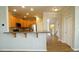 Bright kitchen featuring stainless steel appliances, wood cabinets and an eat-in bar area at 4517 Pale Moss Dr, Raleigh, NC 27606