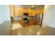 Kitchen featuring wooden cabinets, stainless steel appliances, stone countertops at 4517 Pale Moss Dr, Raleigh, NC 27606