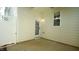 Cozy rear patio with a door and a large window to the house at 4517 Pale Moss Dr, Raleigh, NC 27606