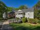 Charming condo with manicured landscaping, a covered porch, and a convenient ramp for easy access at 505 Gooseneck Dr # B1, Cary, NC 27513