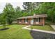 Charming single-story brick home with a well-maintained front yard and inviting walkway at 508 Solar Dr, Raleigh, NC 27610