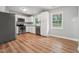 Modern kitchen with stainless steel appliances, white cabinets, and plenty of counter space at 508 Solar Dr, Raleigh, NC 27610