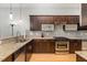 Well-equipped kitchen with granite countertops, stainless appliances, and ample cabinet space at 511 Hillsborough St # 103, Chapel Hill, NC 27514