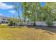 Expansive backyard with lush greenery and a privacy fence, perfect for outdoor activities and entertaining at 512 Flip Trl, Cary, NC 27513