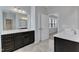 Bright bathroom featuring dual vanities, modern fixtures, and lots of counter space at 512 Flip Trl, Cary, NC 27513