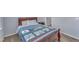 Charming bedroom with hardwood furniture and plush bedding, providing a comfortable and stylish space at 512 Flip Trl, Cary, NC 27513