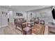 Inviting living room with comfortable seating, stylish area rug, and natural light from windows at 512 Flip Trl, Cary, NC 27513