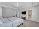 Spacious main bedroom with TV, closet access, and ensuite bath at 512 Flip Trl, Cary, NC 27513